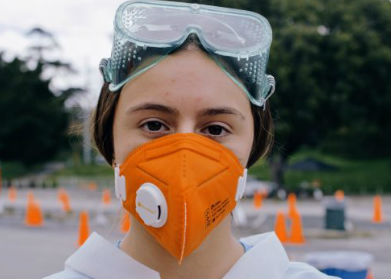 Health Care worker wearing mask during COVID-19 pandemic