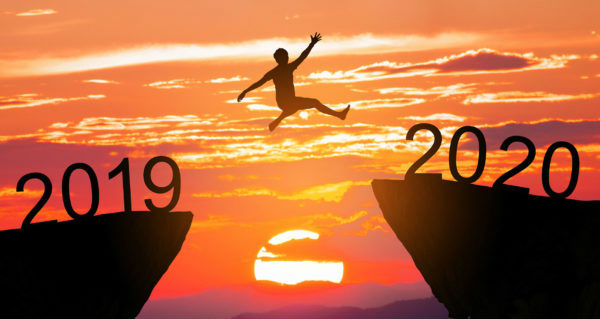 Leap year graphic of person jumping over a canyon