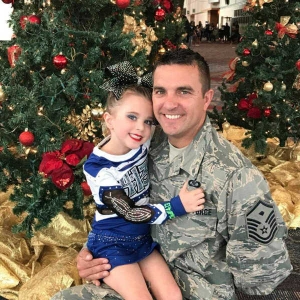 Air Force father holding his daughter